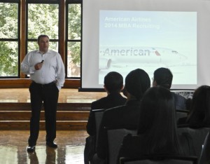 A representative from American Airlines speaks to the graduate student audience.