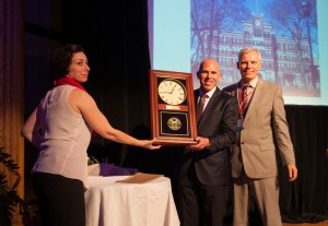 Scott Rechler '89 receives the gift of a clock from President David Angel at the Reunion Dinner on May 16.