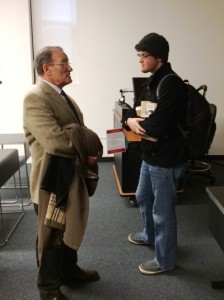 Sophomore Steven Isaacson continues the conversation with guest lecturer Jeffrey Alexander before leaving Prof. Robert Boatright’s political science class (Dec. 2).